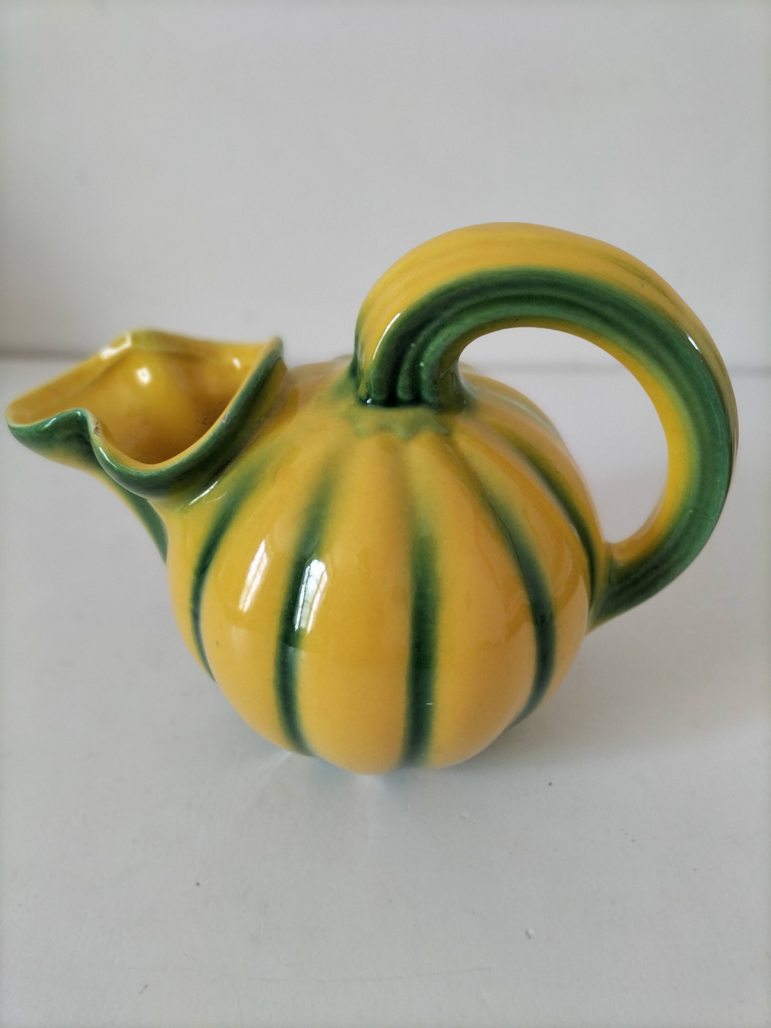 Jug melon in yellow and green majolica