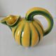 Jug melon in yellow and green majolica
