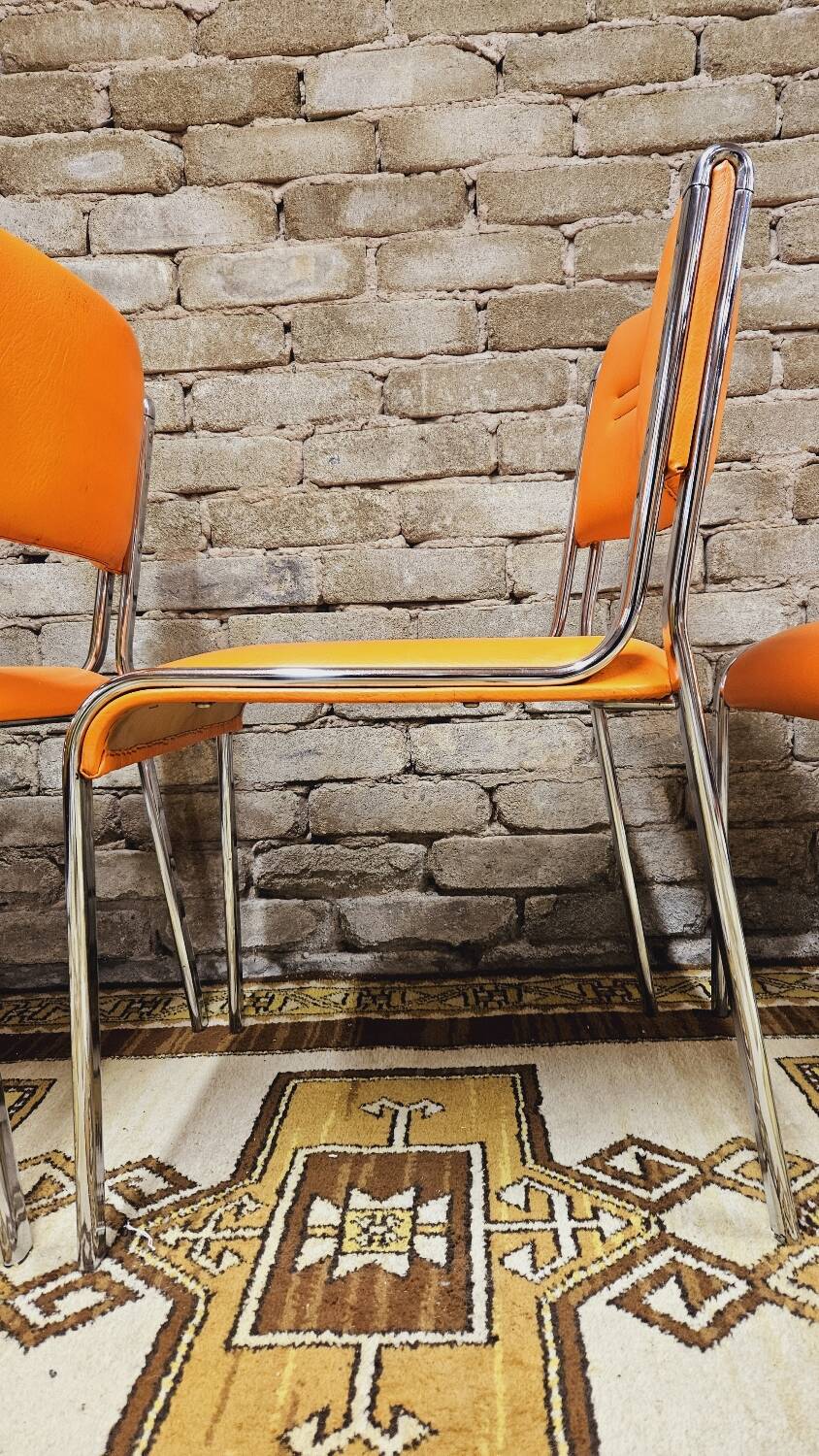 Set of 4 vintage chrome skai orange chairs 1970