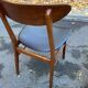 2 Scandinavian chairs in teak and black imitation leather, 1960s