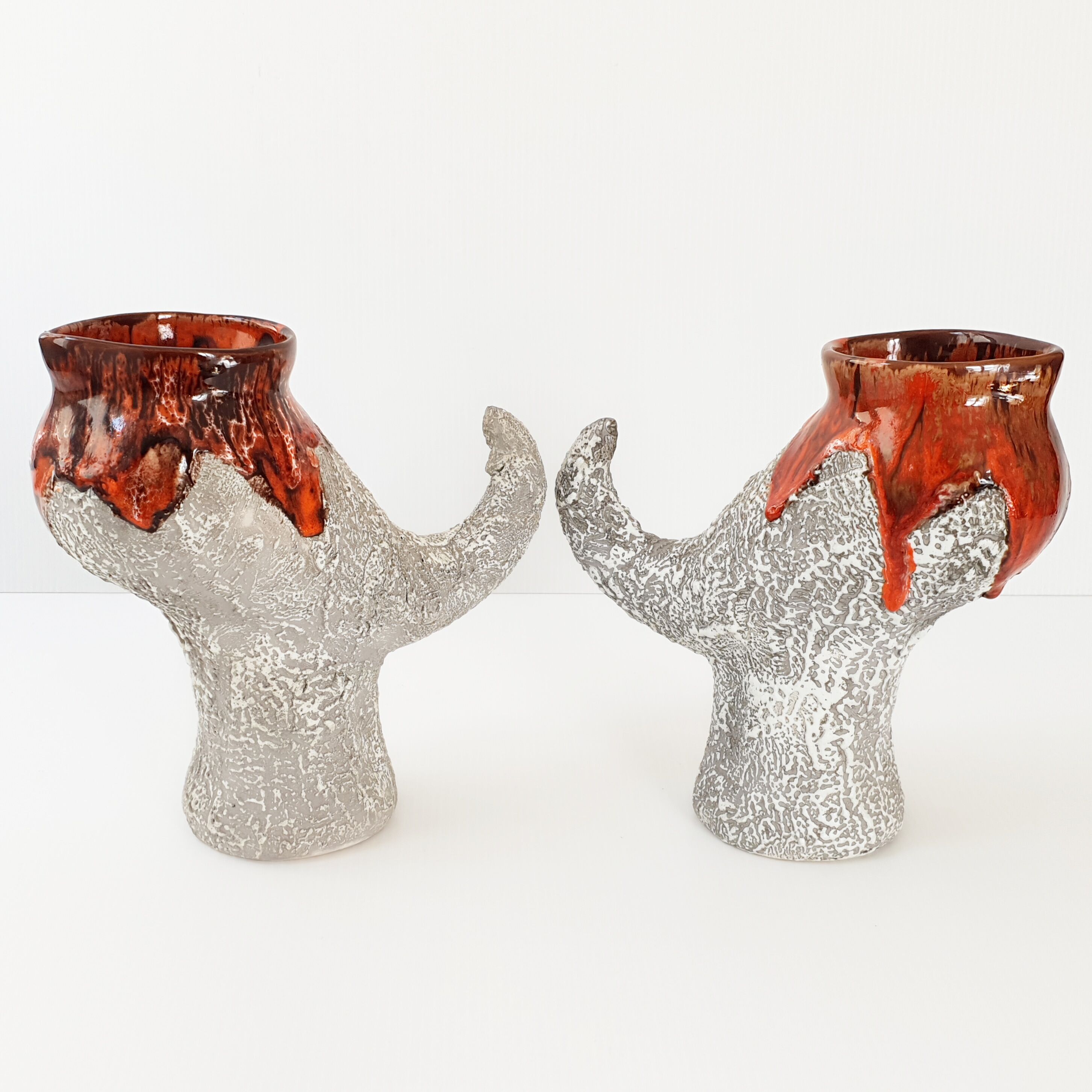 Pair of vintage zoomorphic pitchers