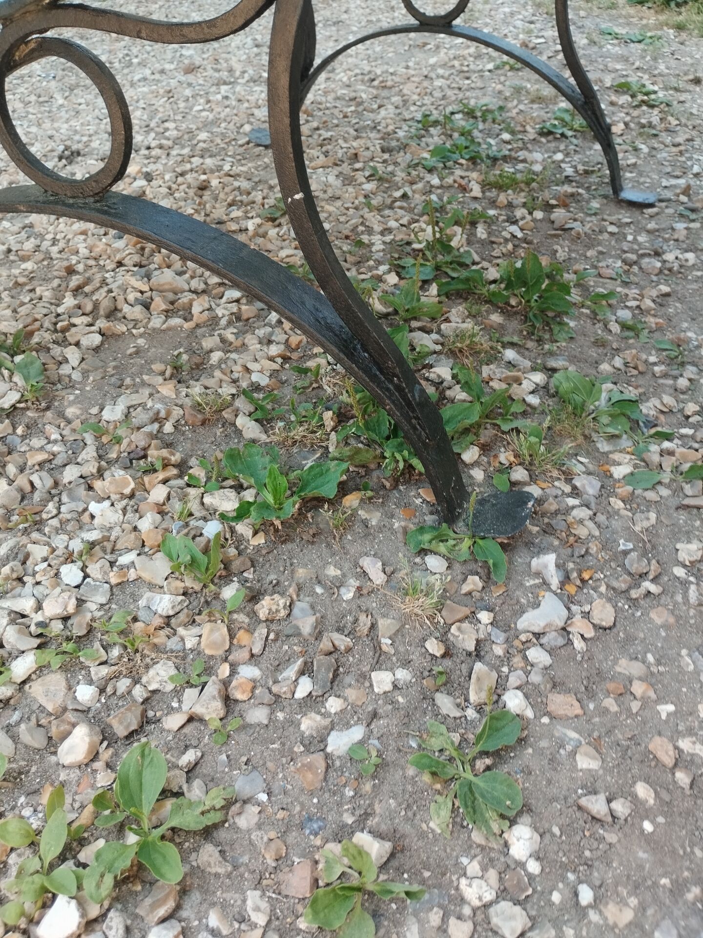Antique garden bench with cast iron legs