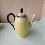 Coffee pot or teapot, sugar bowl and milk jug in porcelain.