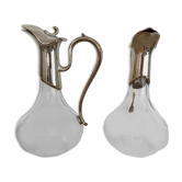Glass decanters and silver metal spouts