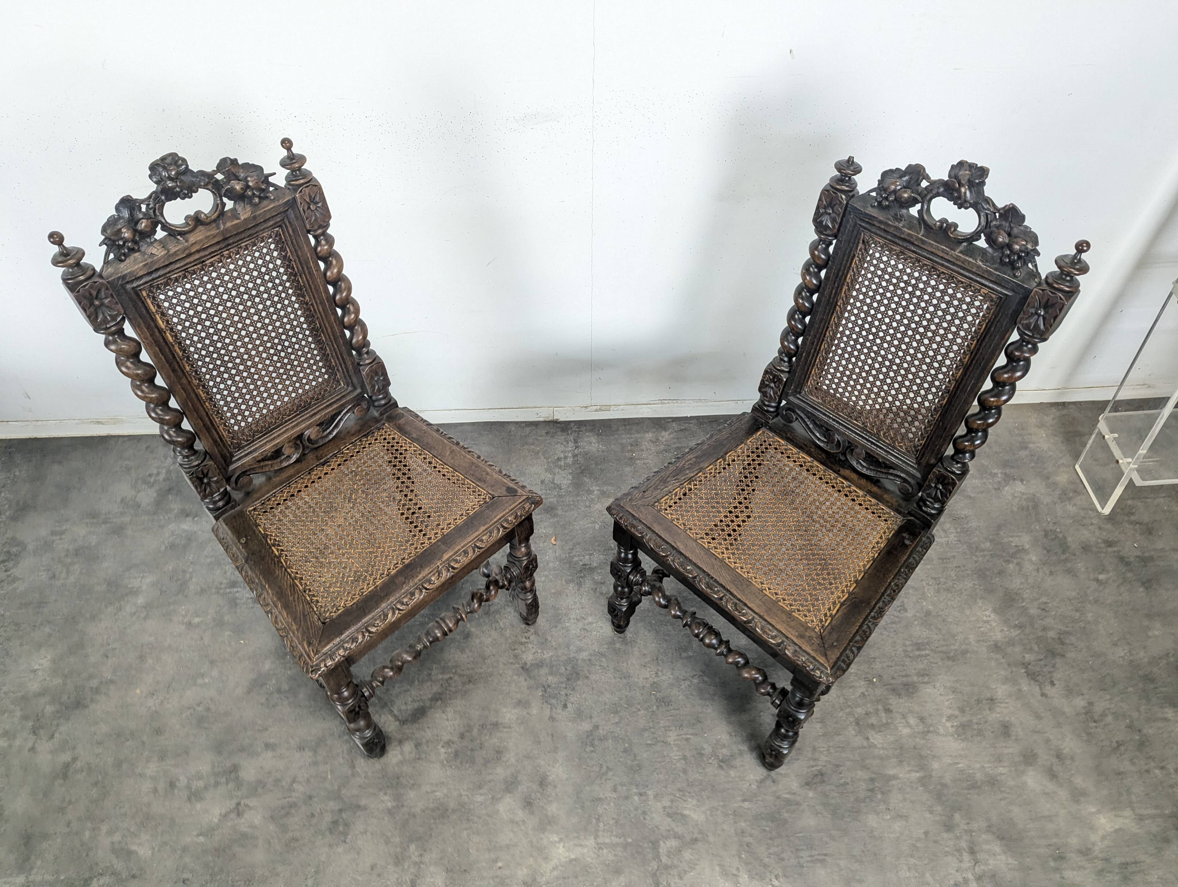 Pair of Louis XIII chairs in twisted oak with caning.