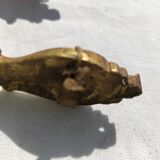 Old curtain kiss in gilded bronze