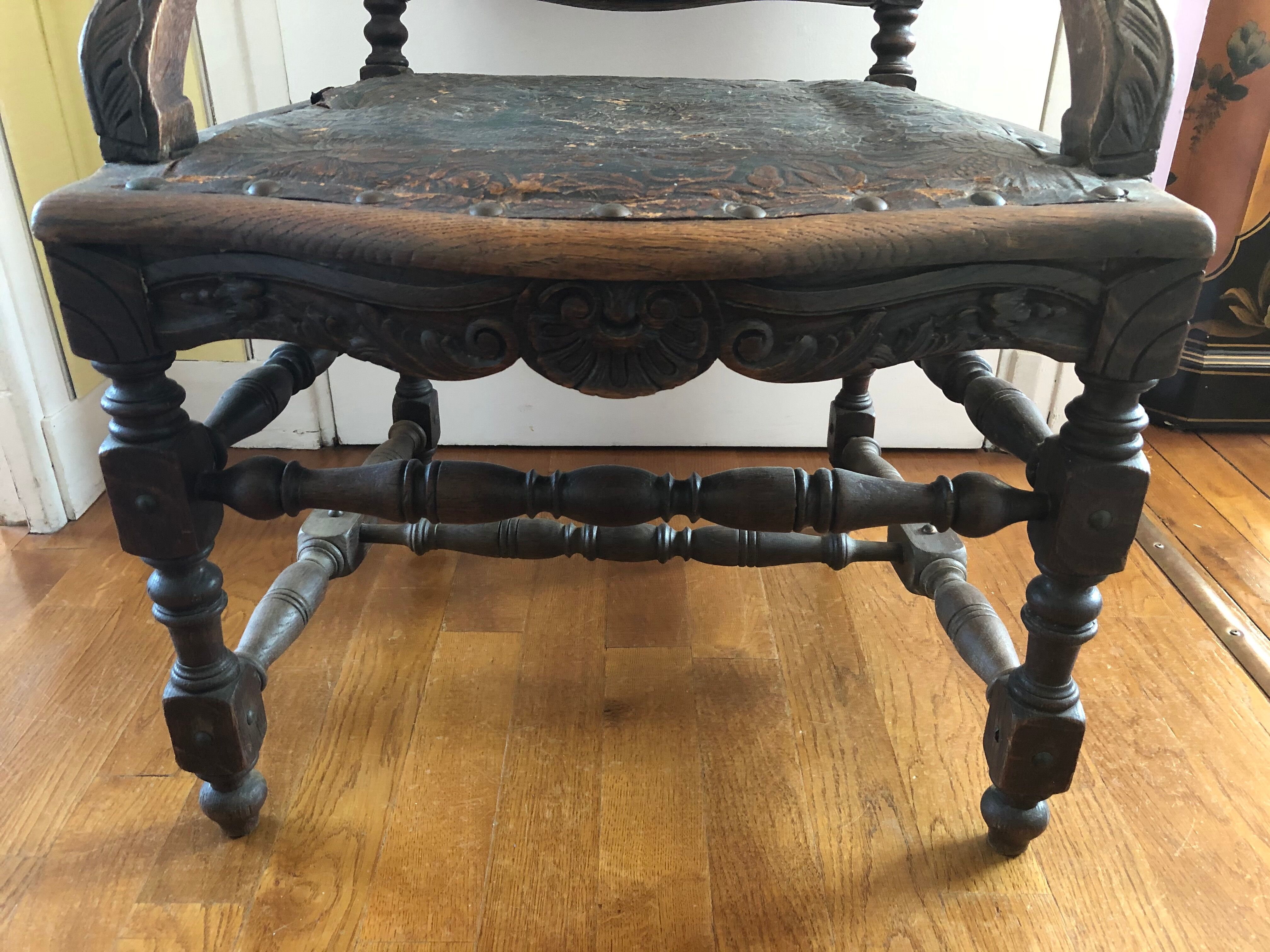 Old carved wooden armchair