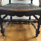 Old carved wooden armchair