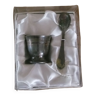 Eggcup and silver spoon