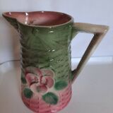 Slush pitcher. Pansy pattern on wicker basket background. Green and pink.