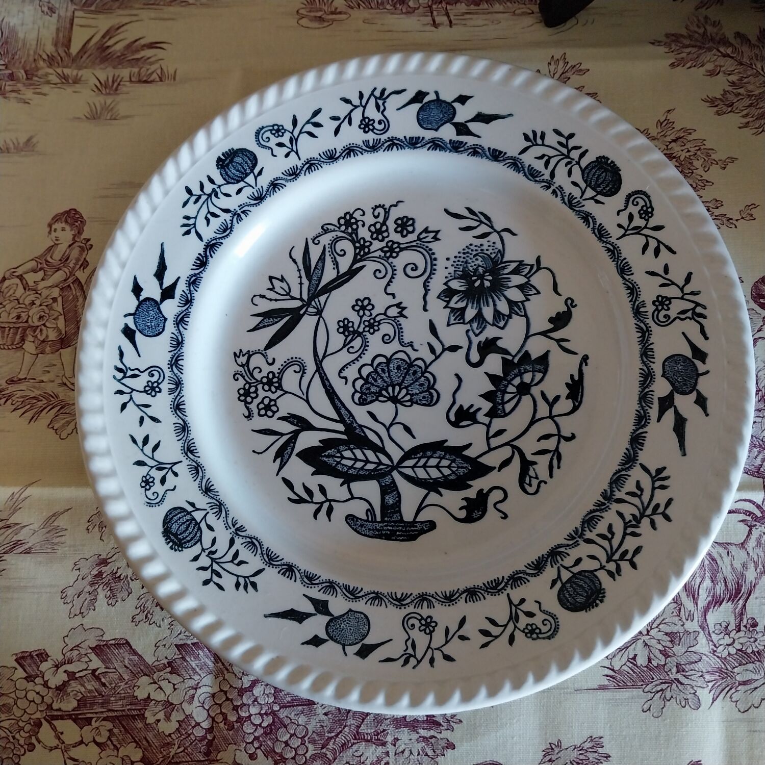 Old plates with blue floral decoration.