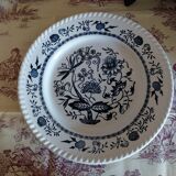 Old plates with blue floral decoration.