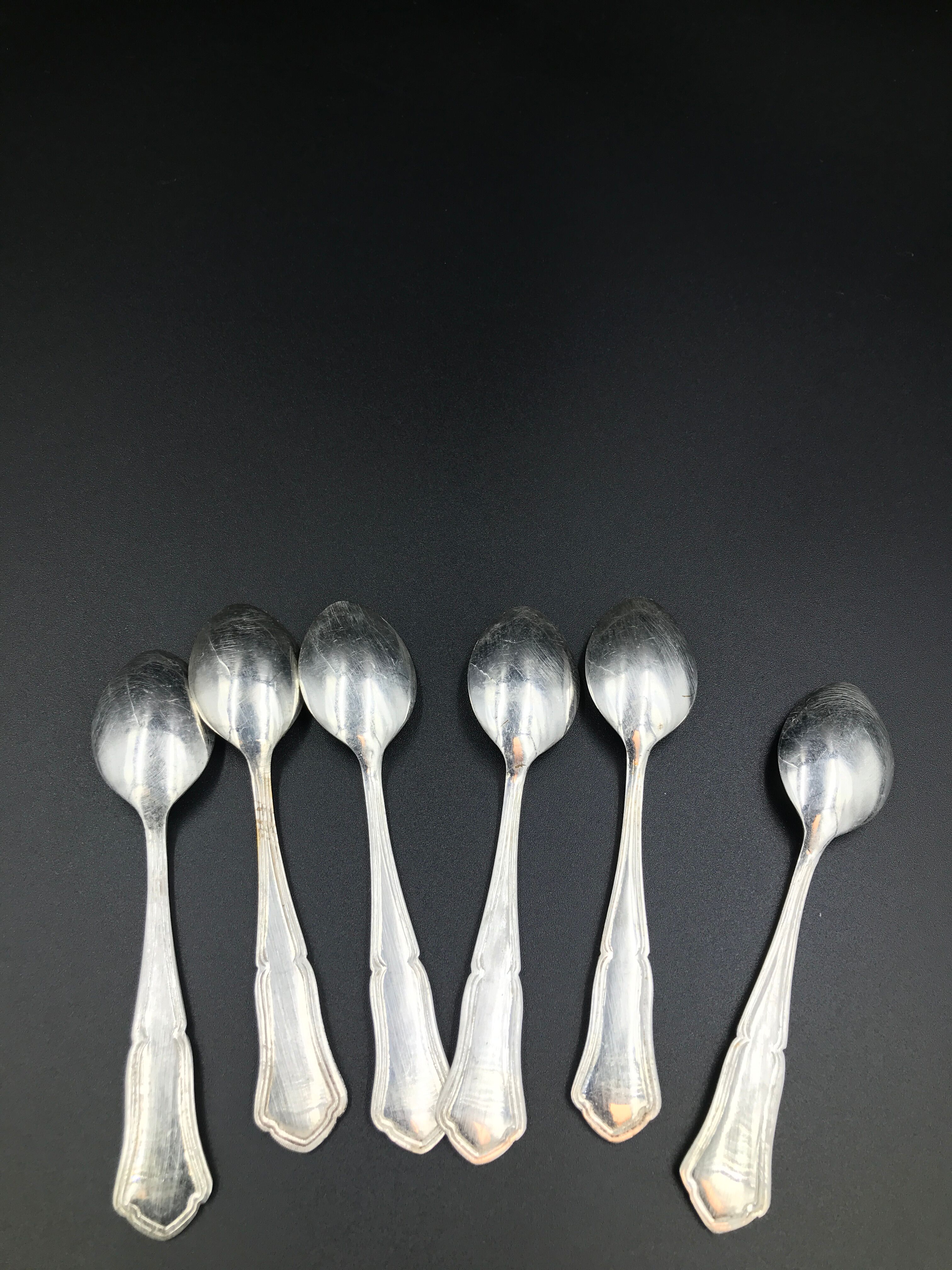 6 small metal silver spoons