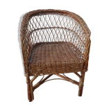 Children's basket chair in vintage braided wicker