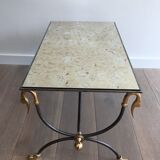 Coffee table in brushed steel and brass