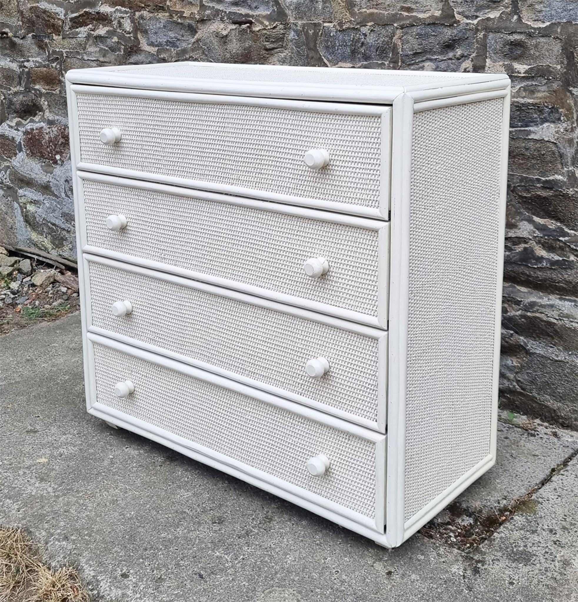 White Maugrion chest of drawers, wood and rattan, 80s