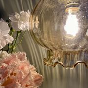 Suspension globe vintage en verre ambré