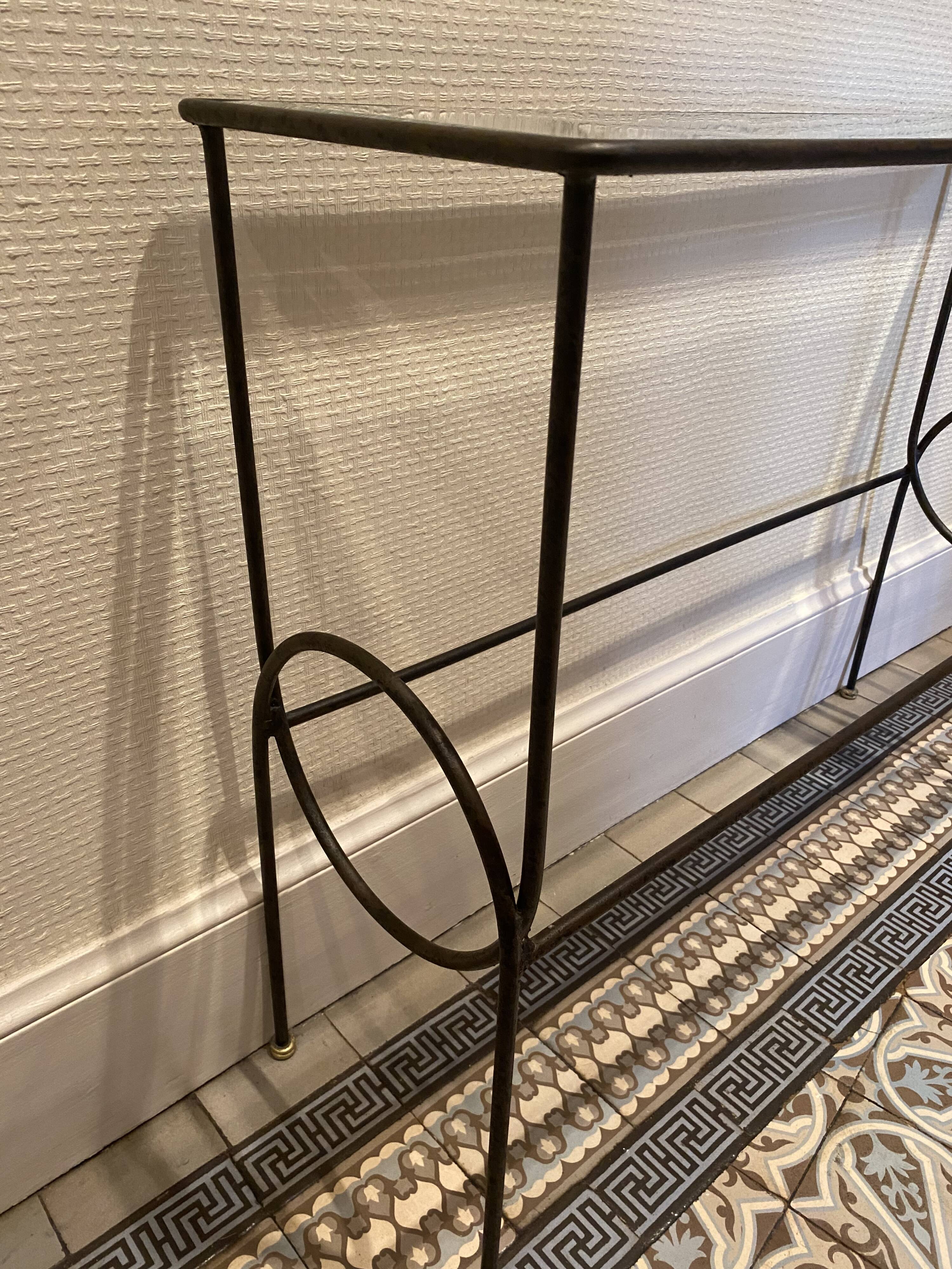 Green console and wrought iron