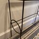 Green console and wrought iron