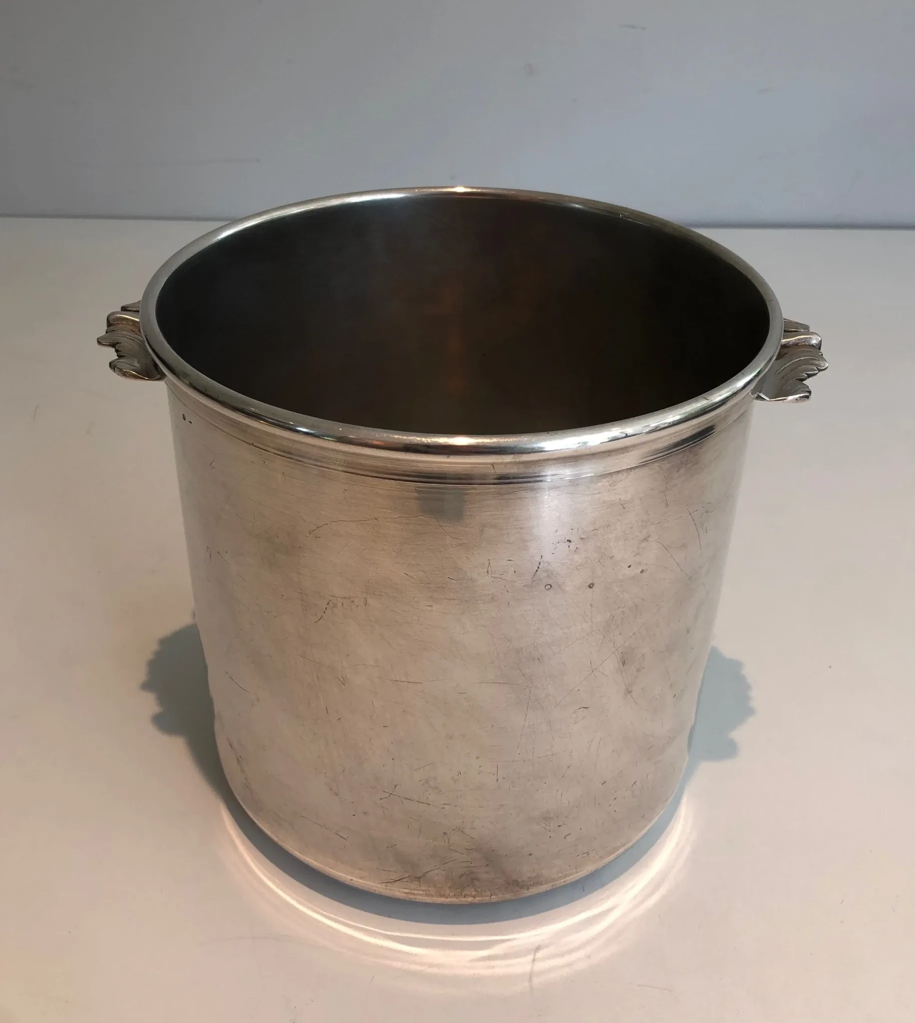 Cylindrical Silver-Plated Champagne Bucket with Small Leaf-Shaped Handles.