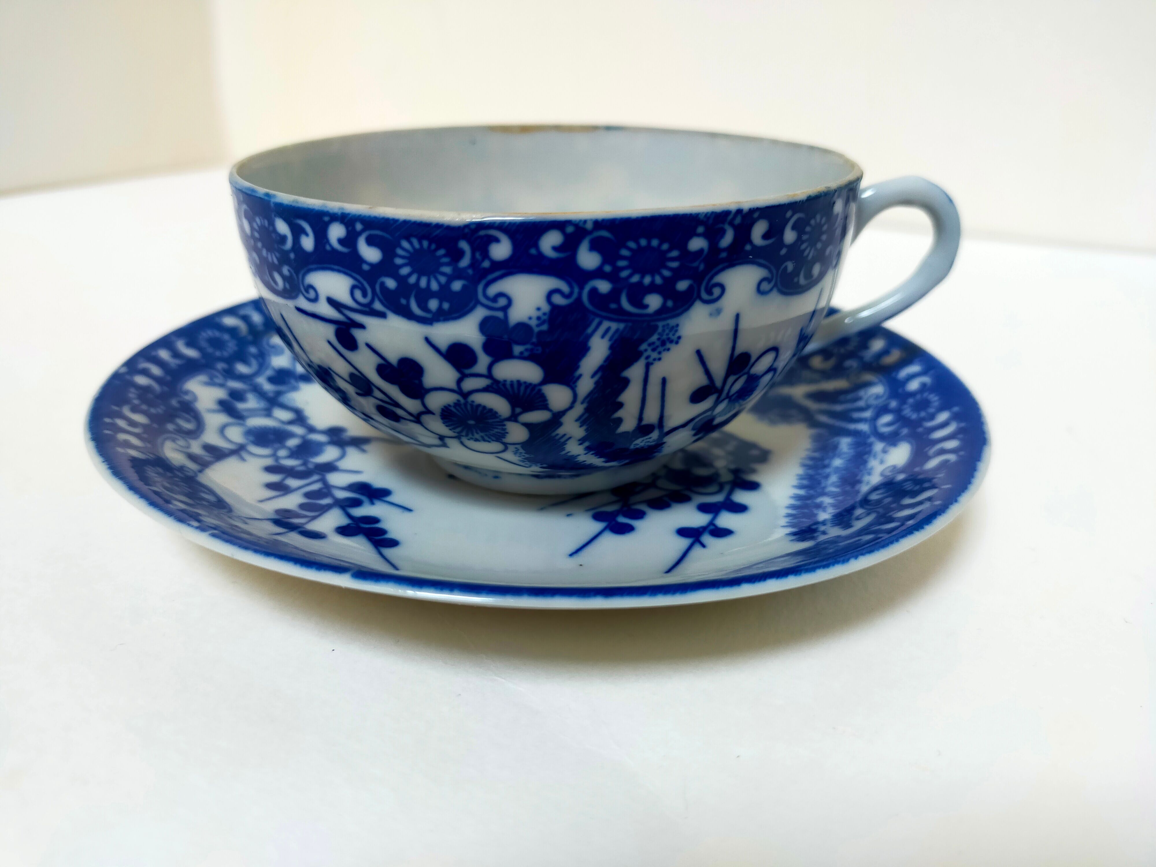 tea cup and Japanese saucer in blue and white porcelain