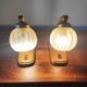 Pair of vintage 1970s mid-century Scandinavian lamps with amber globe.
