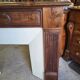 Facade of antique wooden fireplace