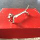 Series of 12 vintage knife holders dogs in silver metal