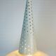 Perforated metal suspension holophanous glass