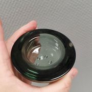 A set of iitalla candle holders in smoked transparent glass.
