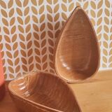 Glazed stoneware bowls for aperitifs or as catchalls in the shape of a walnut, signed.