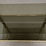 Hollywood Regency gilt metal and smoked glass shelf, Italy circa 1970