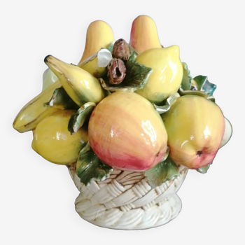 Basket with ceramic fruit decoration