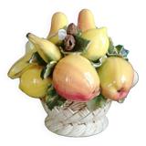 Basket with ceramic fruit decoration