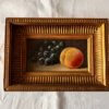 Still Life with Peaches and Black Grapes