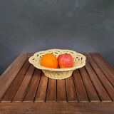 Yellow openwork woven earthenware basket