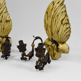 Pair of Hollywood Regency sconces in carved, painted and patinated wood, 1950s