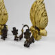 Pair of Hollywood Regency sconces in carved, painted and patinated wood, 1950s