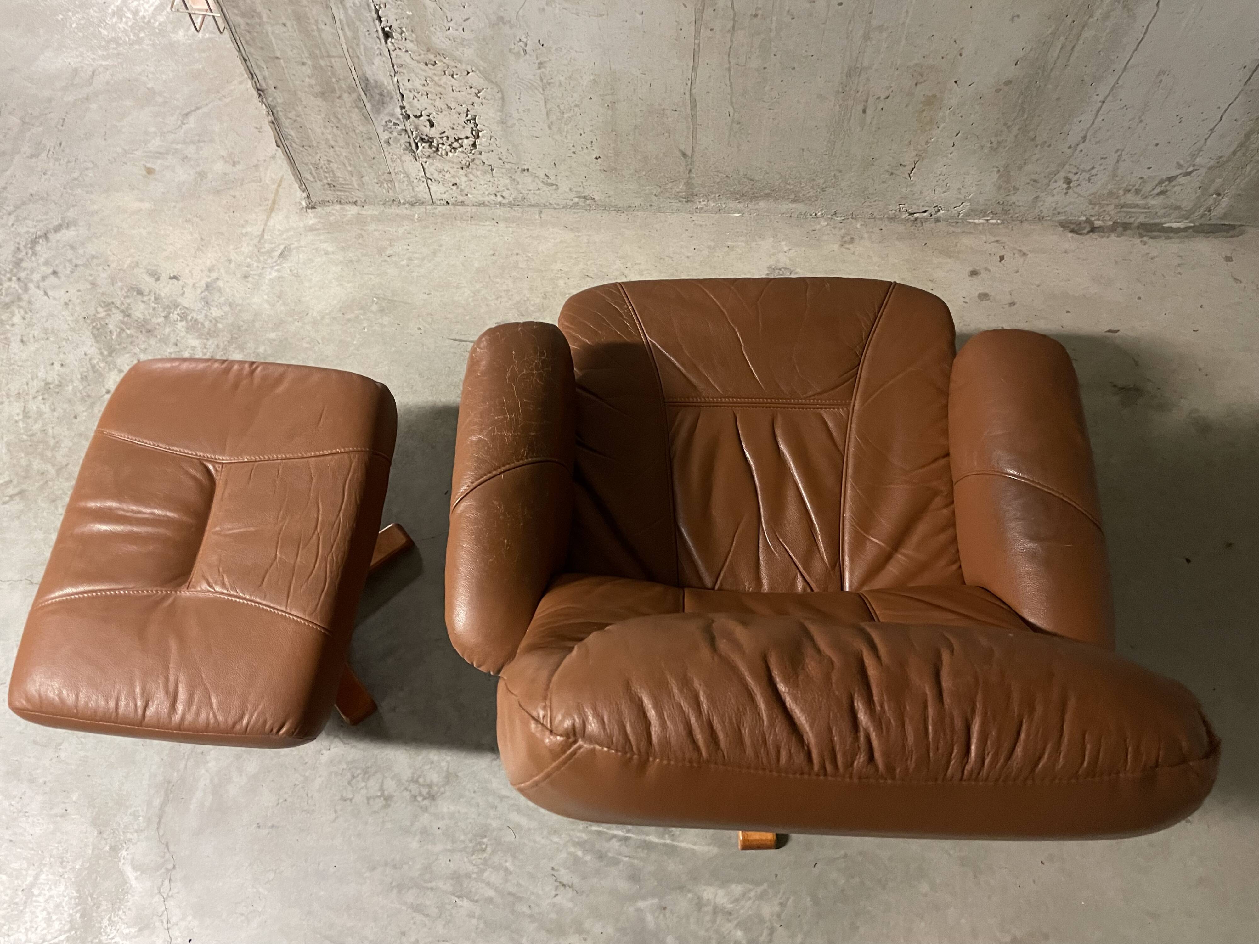Unico leather armchair and ottoman