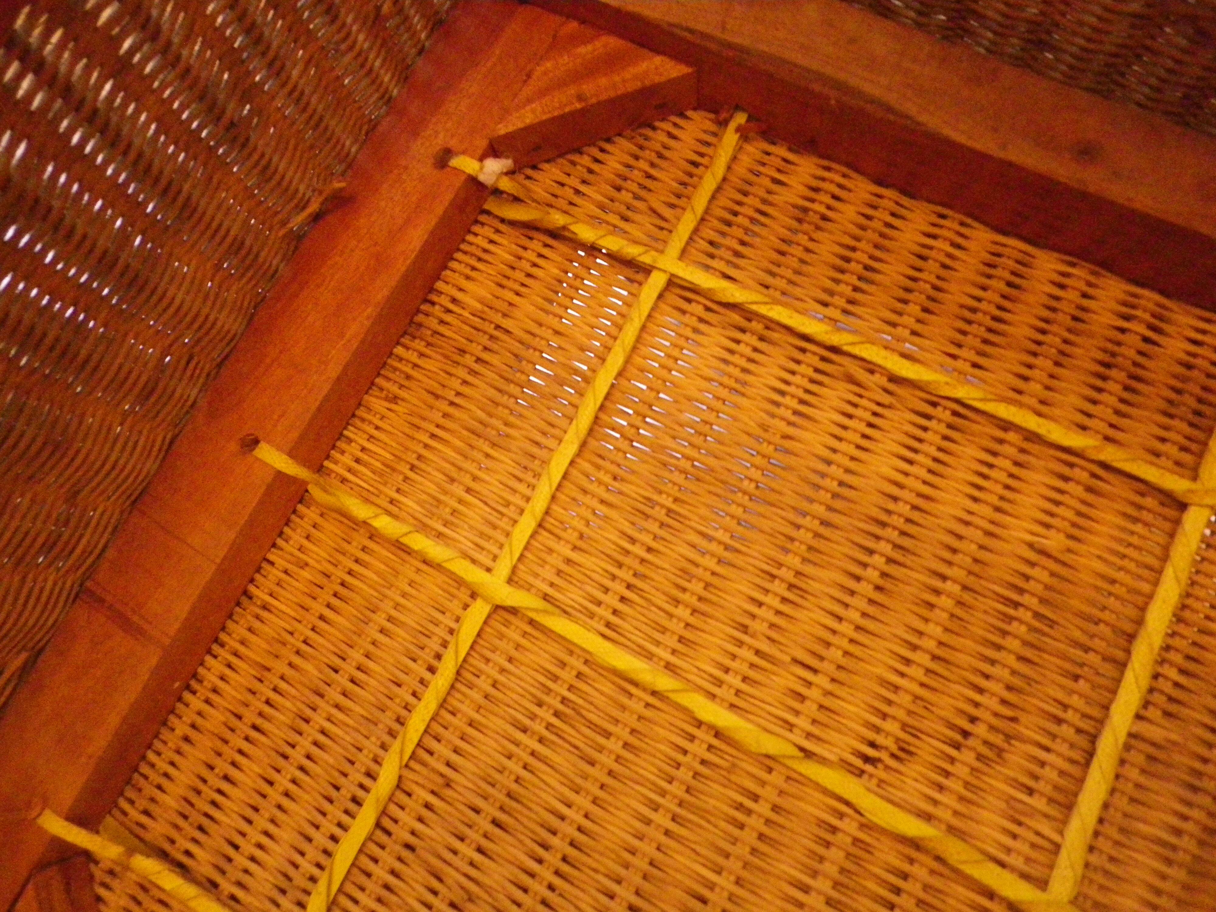 Pair of Club armchairs in ocean liner style, woven rattan and solid wood.