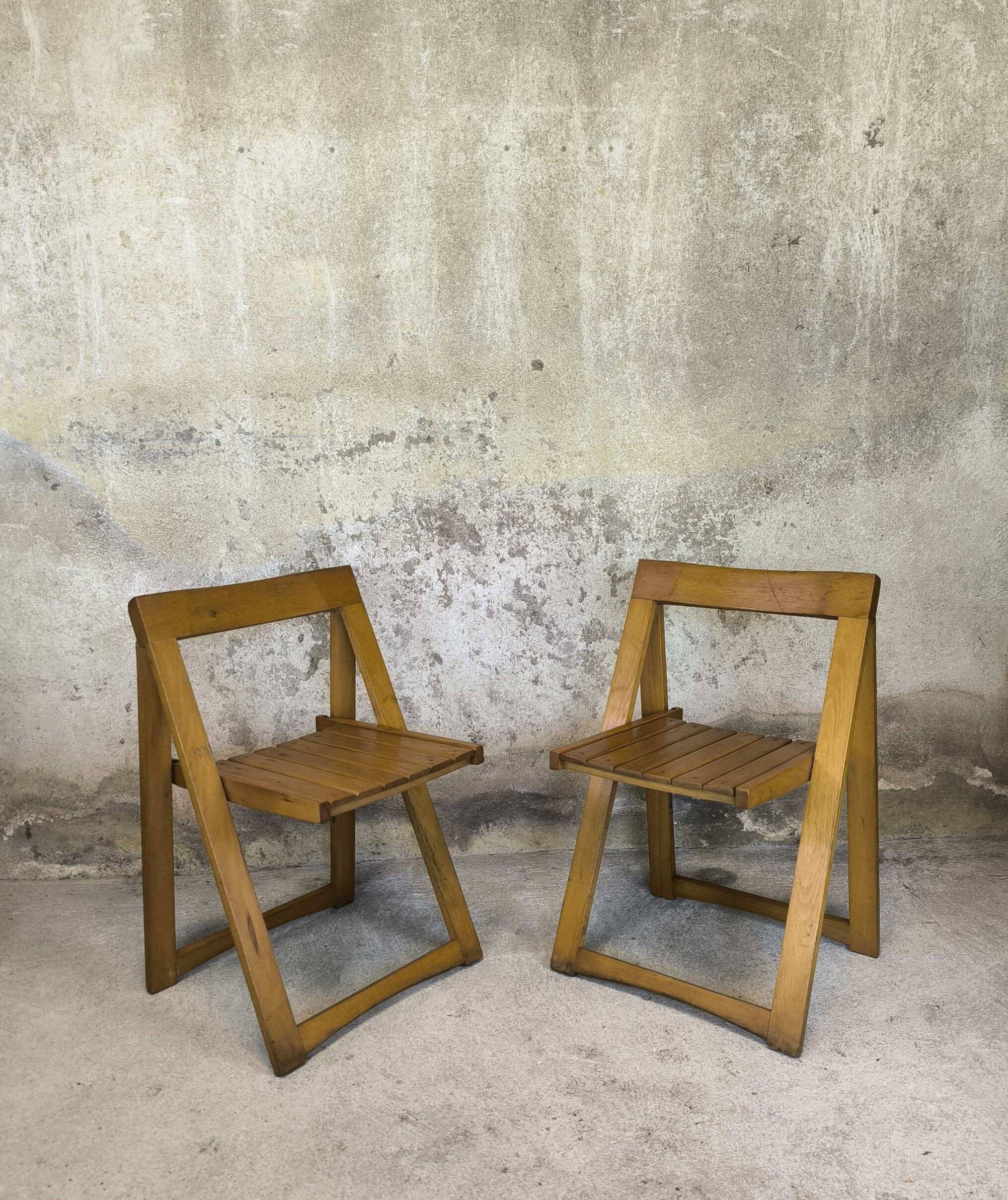 Pair of vintage folding wooden chairs by Aldo Jacober