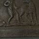 EIGHTEENTH CENTURY CAST IRON FIREPLACE PLATE REPRESENTING A WOMAN AND A WOLF