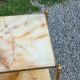 Pair of neoclassical side tables in bronze, brass, marble, and o.