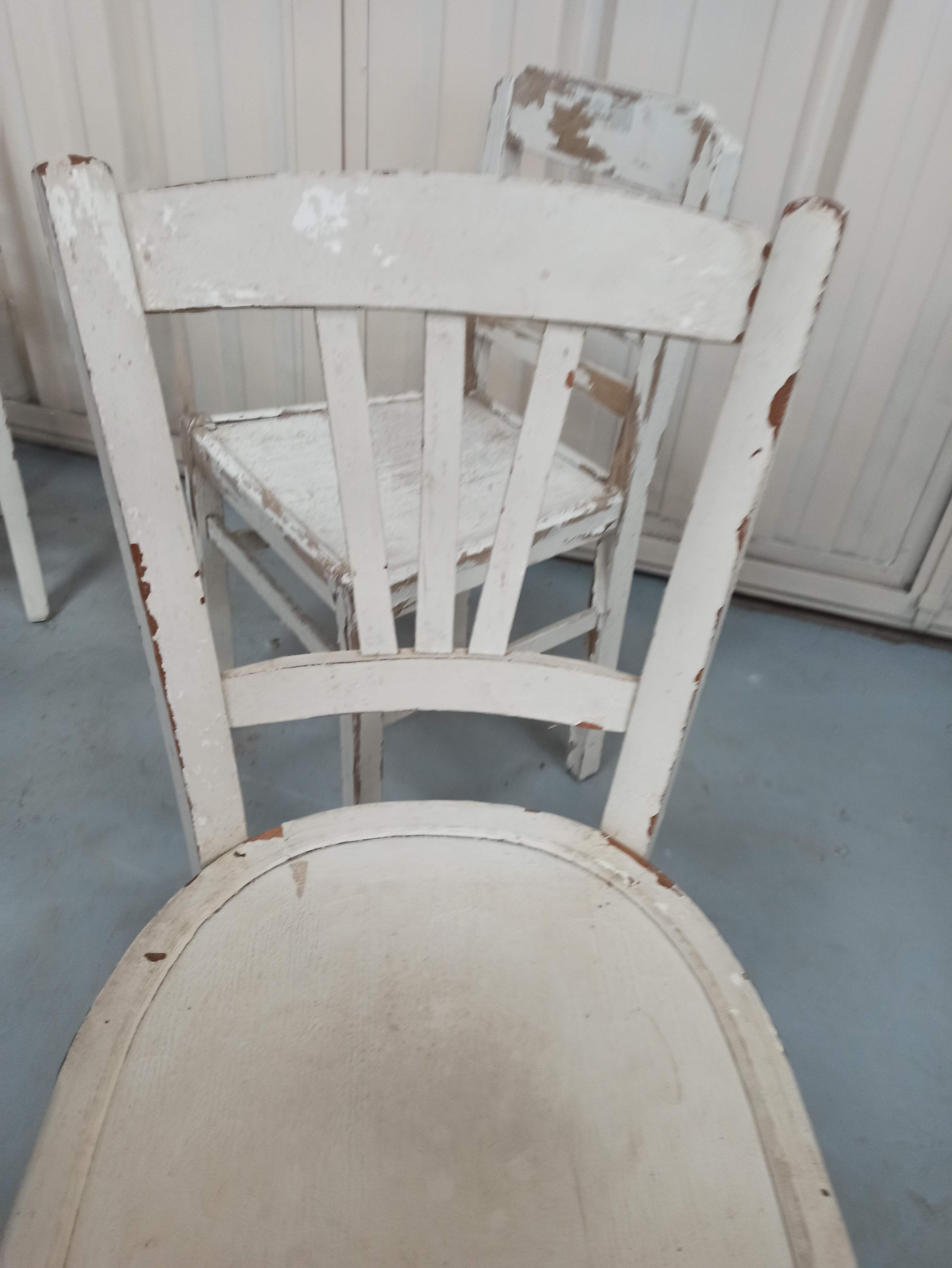 4 patinated white bistro chairs