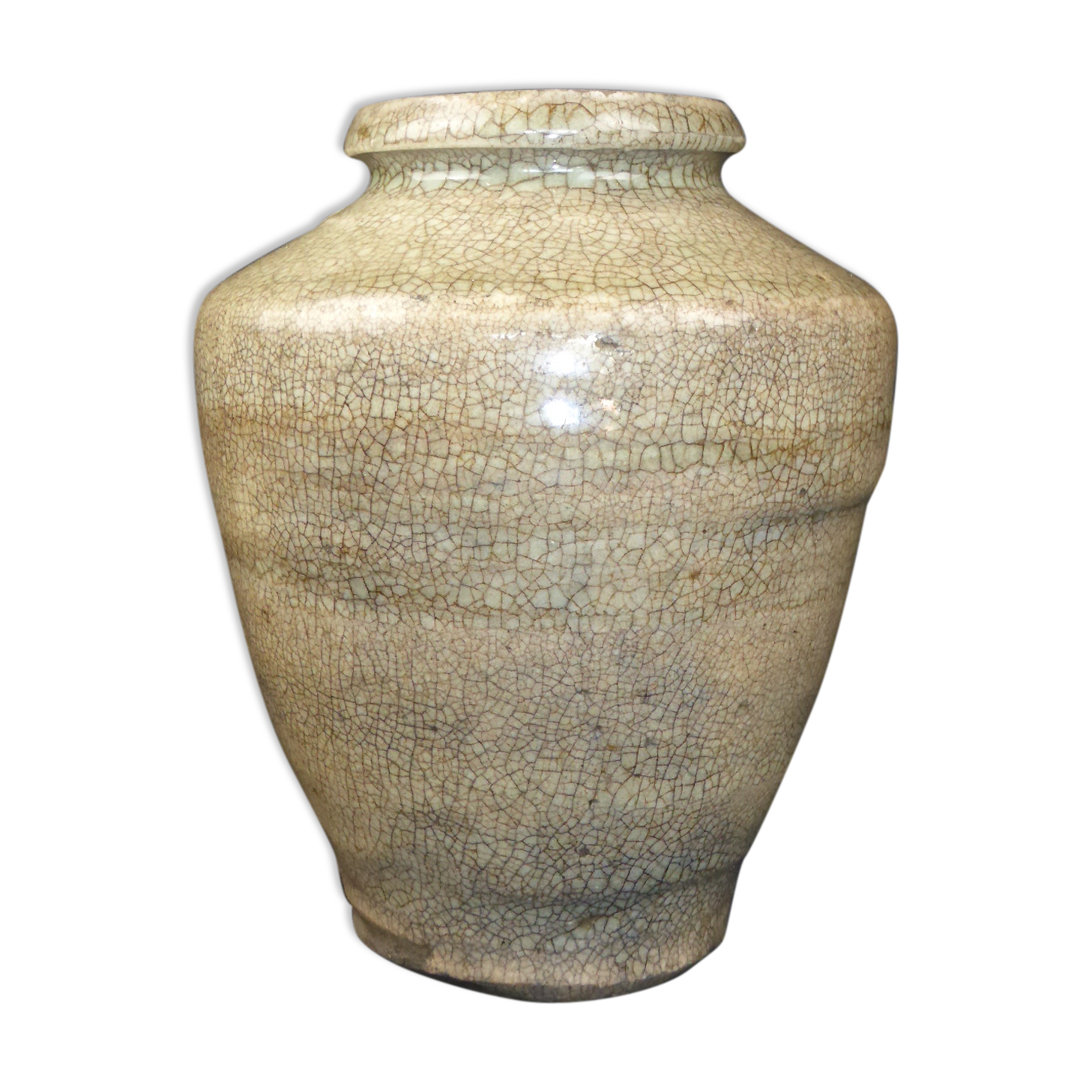 Ancient vase in khaki grey-green cracked sandstone