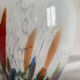 Large blown glass vase with polychrome inclusions in the Murano style.