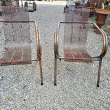 Pair of perforated metal armchairs by René Malaval 1950
