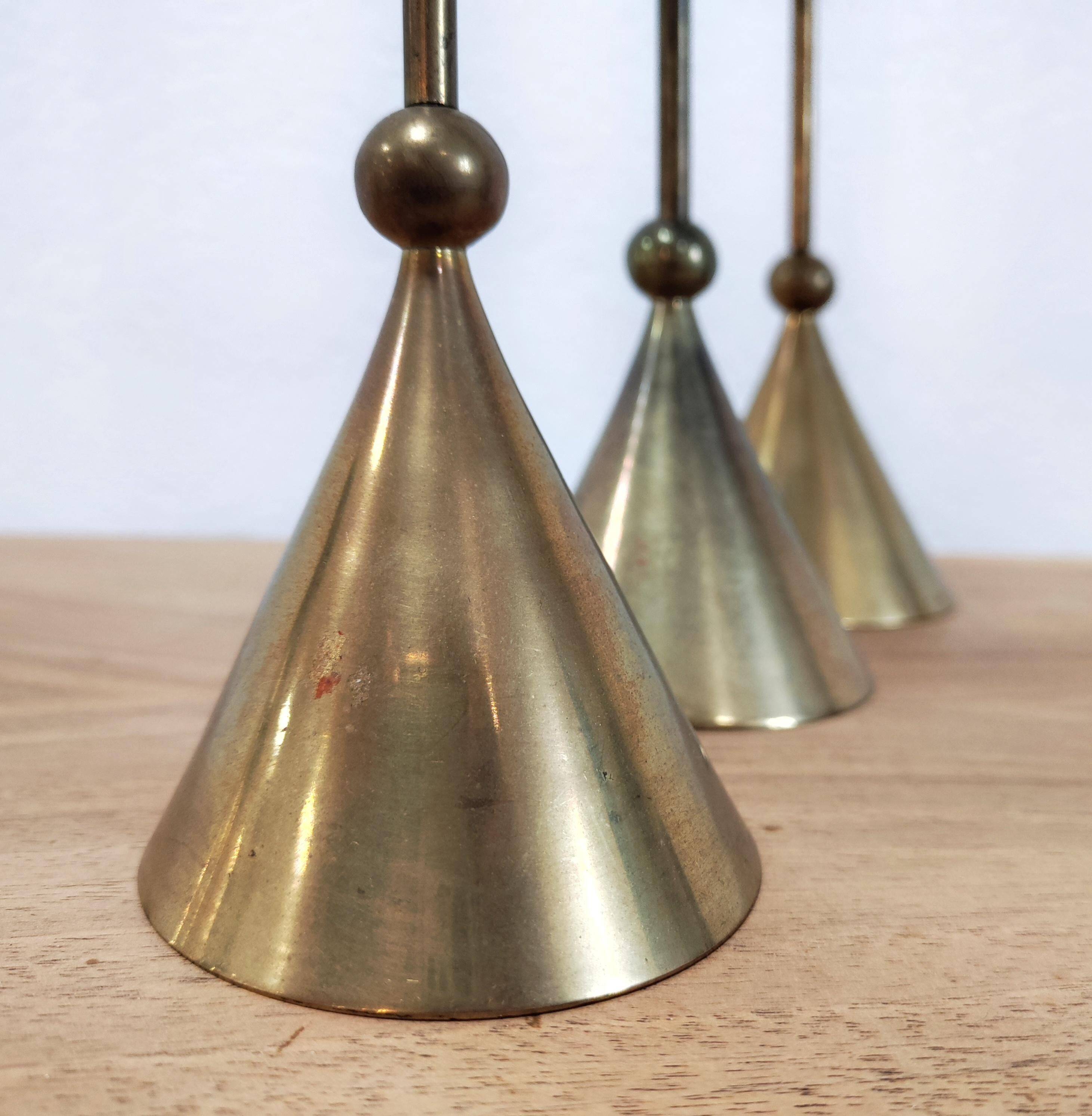 Set of three bronze candlesticks by Christian de Beaumont from the 1980s.