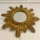 Miroir soleil doré