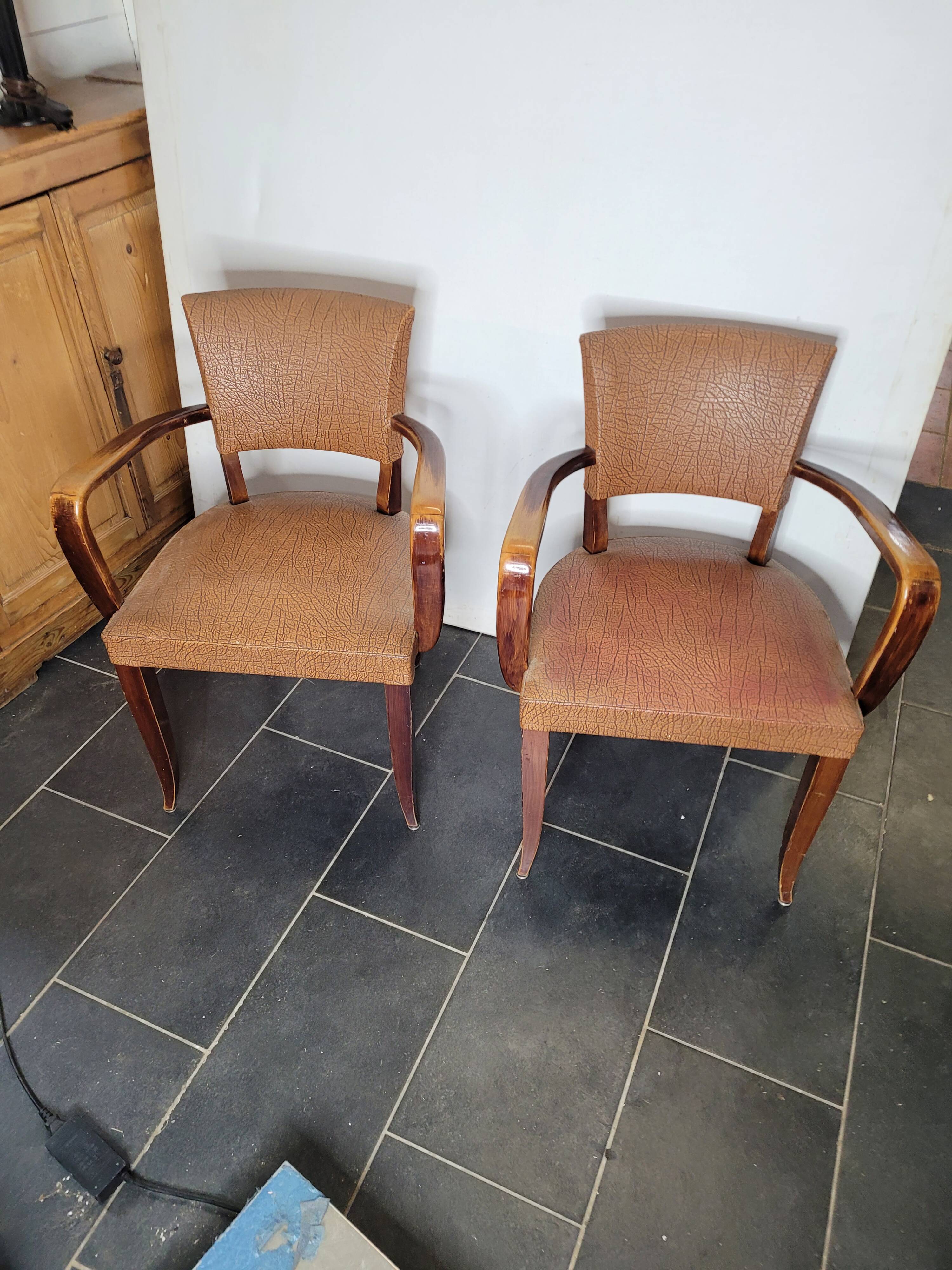 Pair of skai bridge armchairs